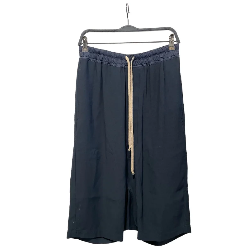 Men's ripped denim shorts for a trendy streetwear aestheticRick Owens/Shorts/6/Cotton/NVY/drop crotch long short Men's ripped denim shorts for a trendy streetwear aestheticRick Owens/Shorts/6/Cotton/NVY/drop crotch long short